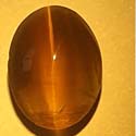Original Sillimanite golden color cat's eye from orissa gems