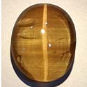Original Sillimanite golden color cat's eye from orissa gems
